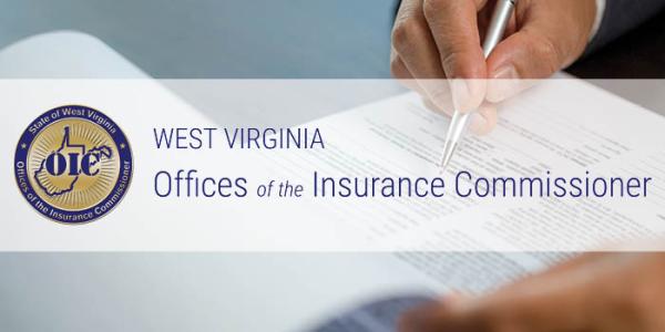 Insurance Commissioner logo over photo of someone signing documents